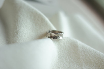 Handcrafted Silver Ring-Stone — hammered band on folded fabric