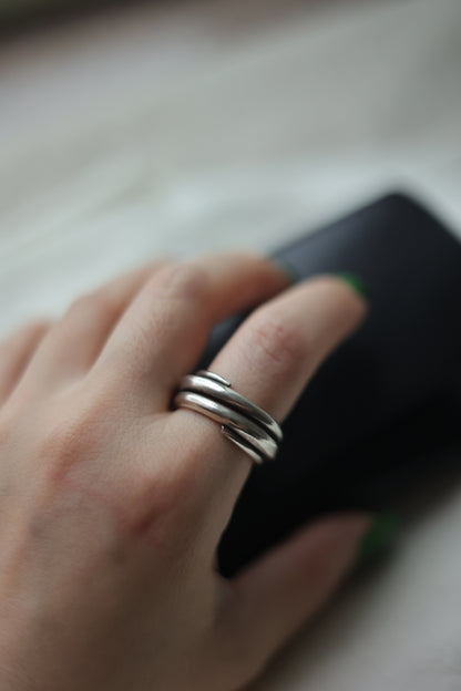 Handcrafted Silver Ring-The Loop — loop band worn on a hand