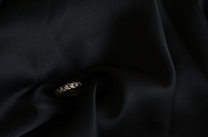 Handcrafted Braided Silver Ring-Unisex — braided band on black fabric