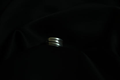 Handcrafted Silver Ring-Unisex — ridged band on black fabric