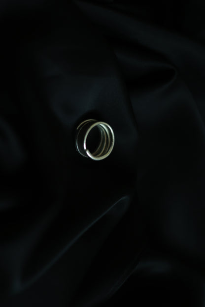 Handcrafted Silver Ring-Unisex — top view on black fabric