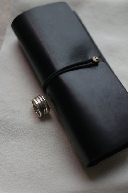 Handcrafted Silver Ring-Unisex — band beside a black case
