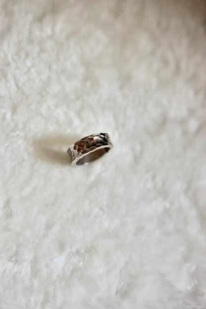 Handcrafted Silver Ring-Stone — band on textured pale fabric