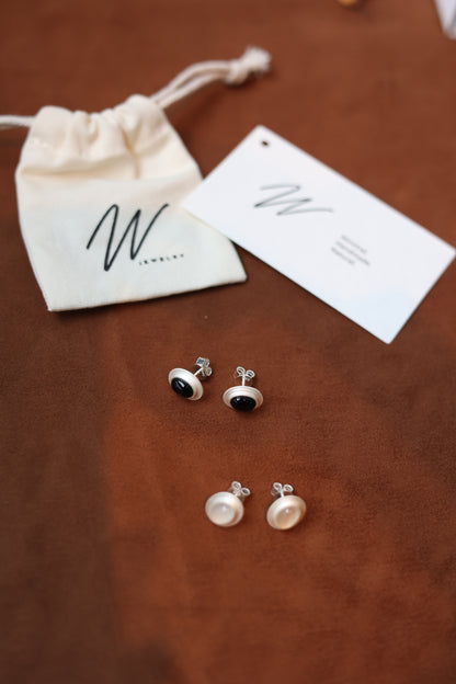 The Classic B & W Onyx Ear Stud — studs with branded pouch and cards