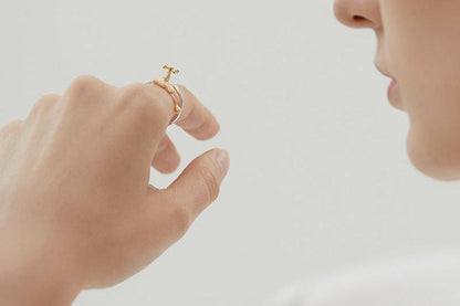 The Tab-Ring — tap ring worn on a hand, close-up