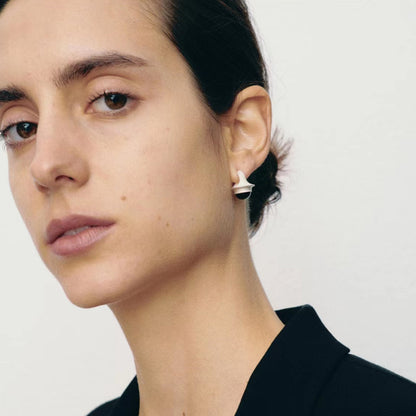 The Classic Agate-B & W — model wearing black-and-white stone earrings