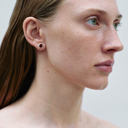 The B & R Agate Ear Stud — red round ear stud worn on an ear