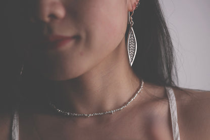 Handcrafted Minimalist Silver Irregular Beaded Necklace — beaded necklace shown with a leaf earring