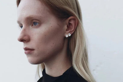 The Water Drops-Minimal Ear Stud — small water-drop studs worn on an ear