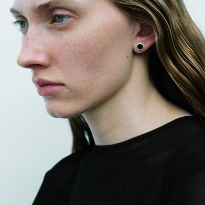 The B & R Agate Ear Stud — black round ear stud worn with black top