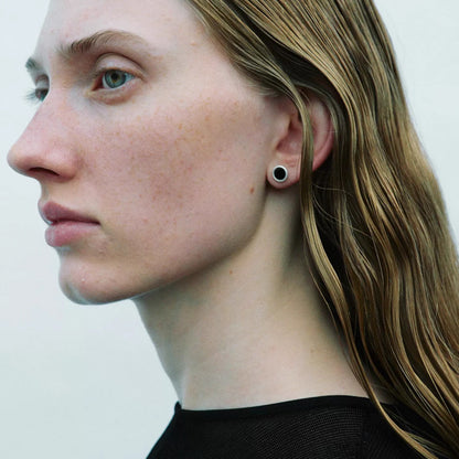 The B & R Agate Ear Stud — close-up of red round ear stud worn on an ear