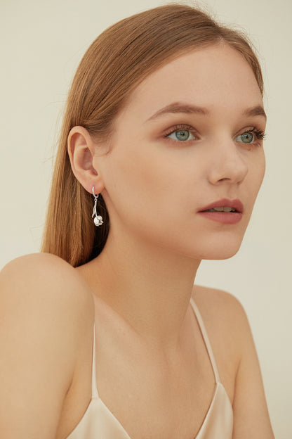 The Tulips-Earrings — model wearing silver-tone tulip earring