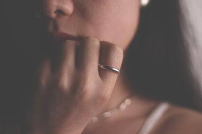 Handcrafted Minimalist Basic Silver Ring — close-up of smooth band worn on a hand