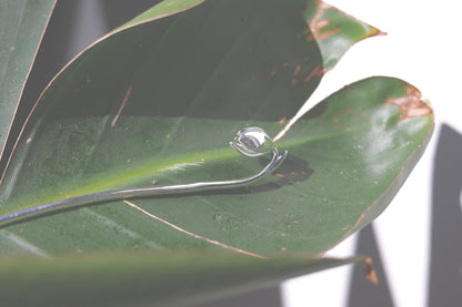 Magnolia Flower Hair Pin — flower detail of hair pin on a green leaf