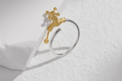 The Tab-Ring — tap-detail ring beside a white block