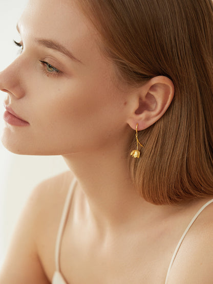 The Tulips-Earrings — side view of model wearing tulip earring