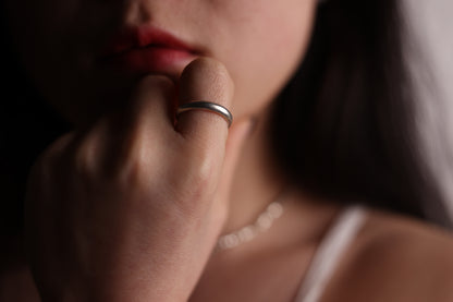 Handcrafted Minimalist Basic Silver Ring — smooth band worn on a hand