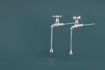 The Tab- Earrings — silver-tone tap-shaped earrings hanging from a bar