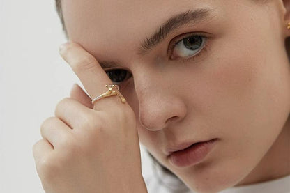 The Tab-Handcrafted Silver Set — close-up of model wearing tap ring and earrings