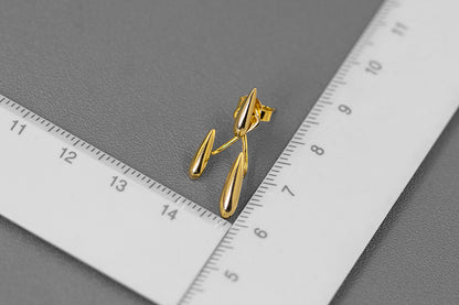Rain Drops Earrings — gold-tone earrings photographed beside a ruler