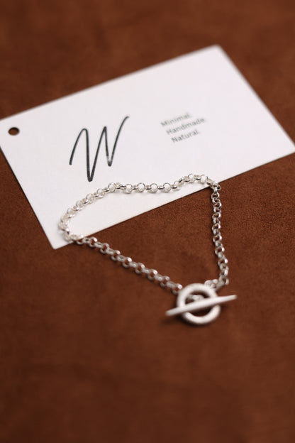Handcrafted The Minimalist Basic Bracelet — chain bracelet looped beside card
