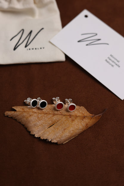 The B & R Agate Ear Stud — red and black ear studs beside brand cards