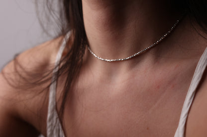 Minimalist Handcrafted Silver Beaded Necklace- Thin — fine beaded necklace worn around the neck