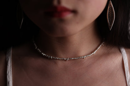 Handcrafted Minimalist Silver Irregular Beaded Necklace — beaded necklace worn around the neck