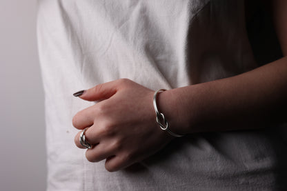 The Knot Set — model wearing knot ring and matching bangle