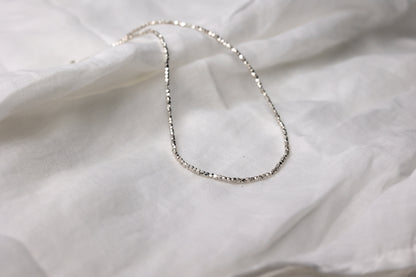 Minimalist Handcrafted Silver Beaded Necklace- Thin — fine beaded necklace arranged in a loop