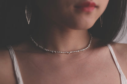 Handcrafted Minimalist Silver Irregular Beaded Necklace — beaded necklace worn with leaf earrings