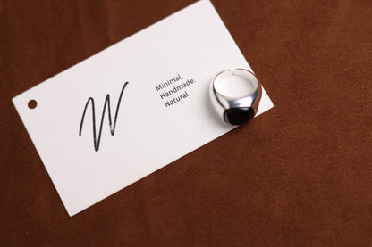 The Smoky Quartz Signet Ring — top view of dark-stone signet ring