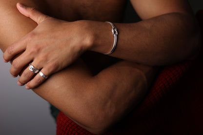 Handcrafted Minimal Style Silver Bangle-The Knot — knot bangle worn with a ring