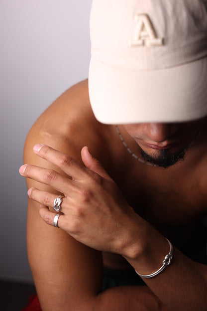 Handcrafted The Knot Ring — knot ring worn on a hand