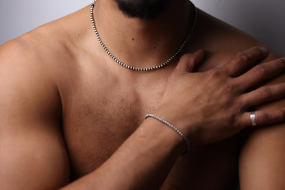 Handwoven Silver Set — model wearing necklace and matching bracelet