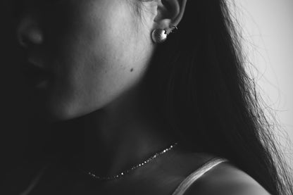 Minimalist Handcrafted Frosted Silver Ear Stud — round frosted stud worn on an ear