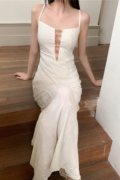 Beige Chic Maxi Dress — seated model wearing beige maxi dress