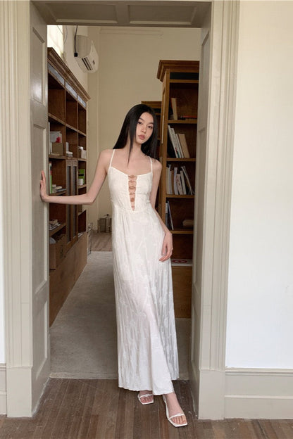 Beige Chic Maxi Dress — full-length beige maxi dress worn indoors