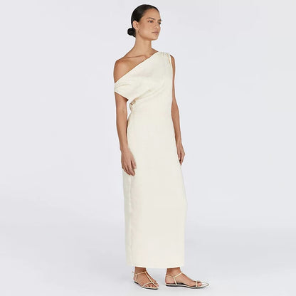 Off Shoulder Linen Maxi Dress — side view of ivory one-shoulder maxi dress